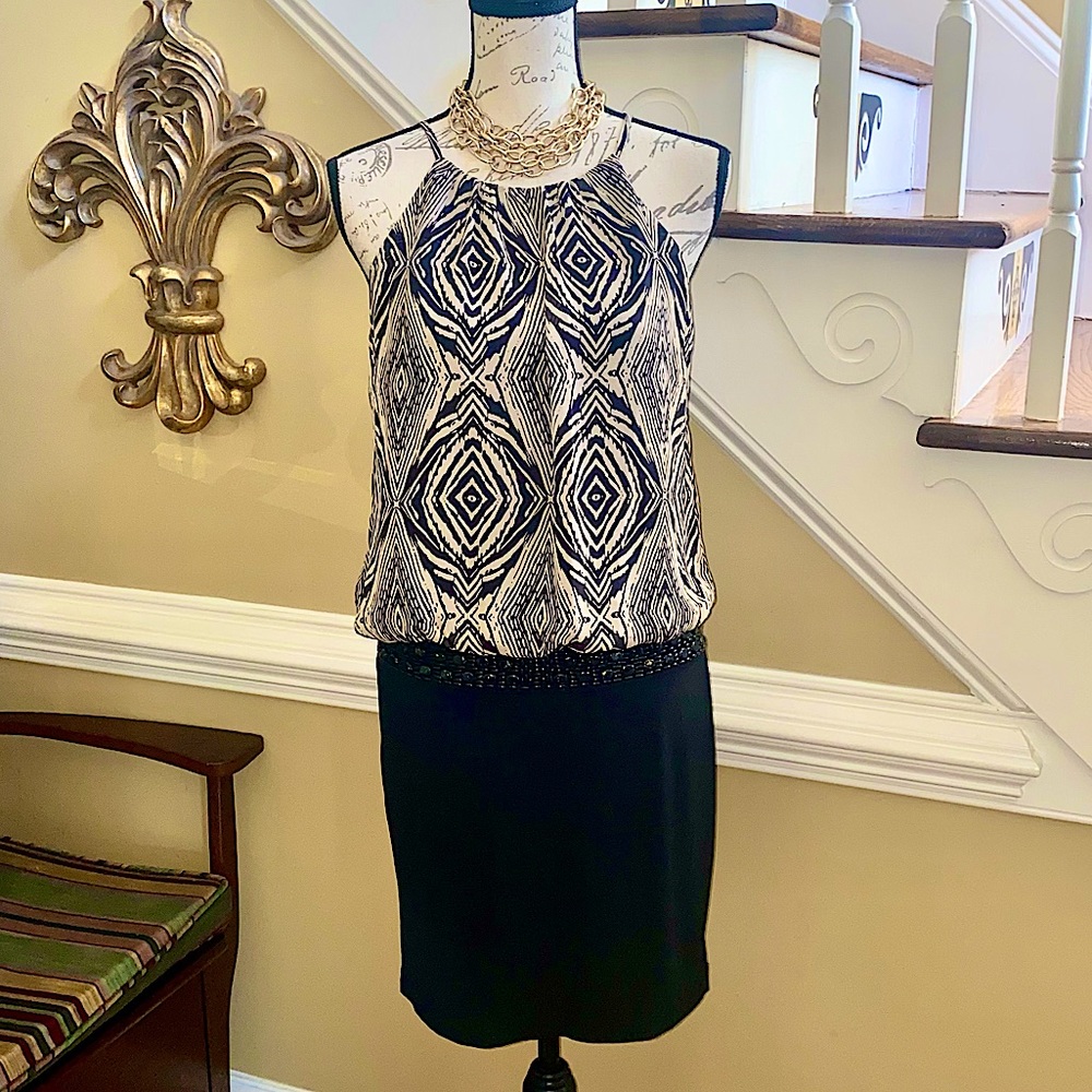 B. Smart halter dress with beaded waist detail